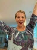 Parent Celebrating Author celebrating with arms in the air