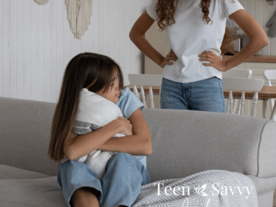 Mother behind a couch yelling at her daughter on the couch. Daughter is upset and hugging a pillow